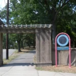 Stone gateway at the southern entrance of Stephen R. Gregg Park, also known as Bayonne County Park, in Bayonne, NJ