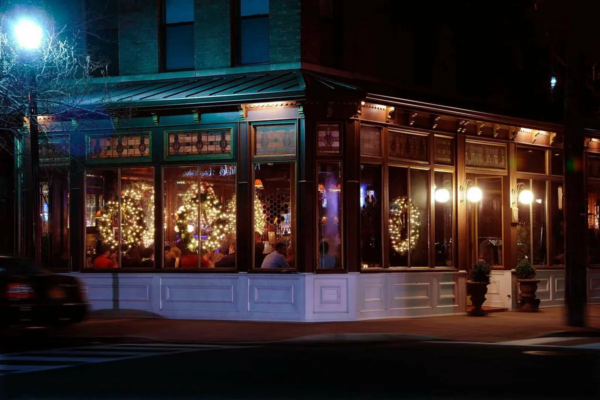 Dino & Harry's Steakhouse lit up at night at 14th and Garden Streets in Hoboken, NJ