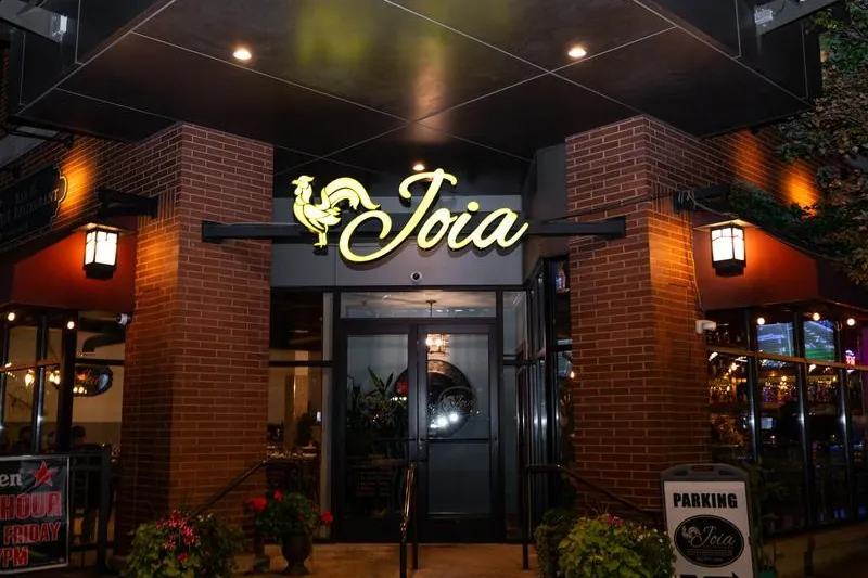 Joia Restaurant front entrance at night in Harrison, NJ