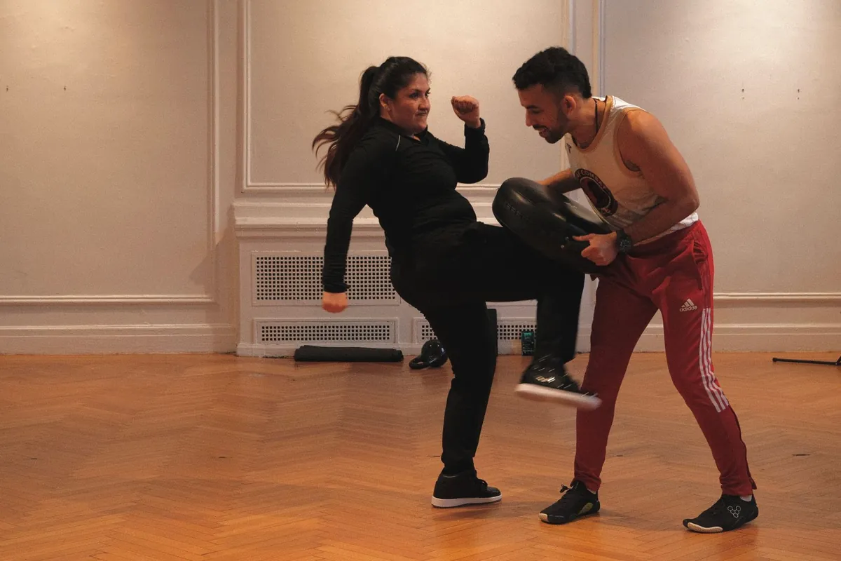 Kickboxing pad work at Kai Combat Club in West New York, NJ