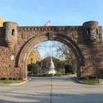 The Fourth Regiment Arch at the entrance to Pershing Field Park in Jersey City Heights on a sunny fall day